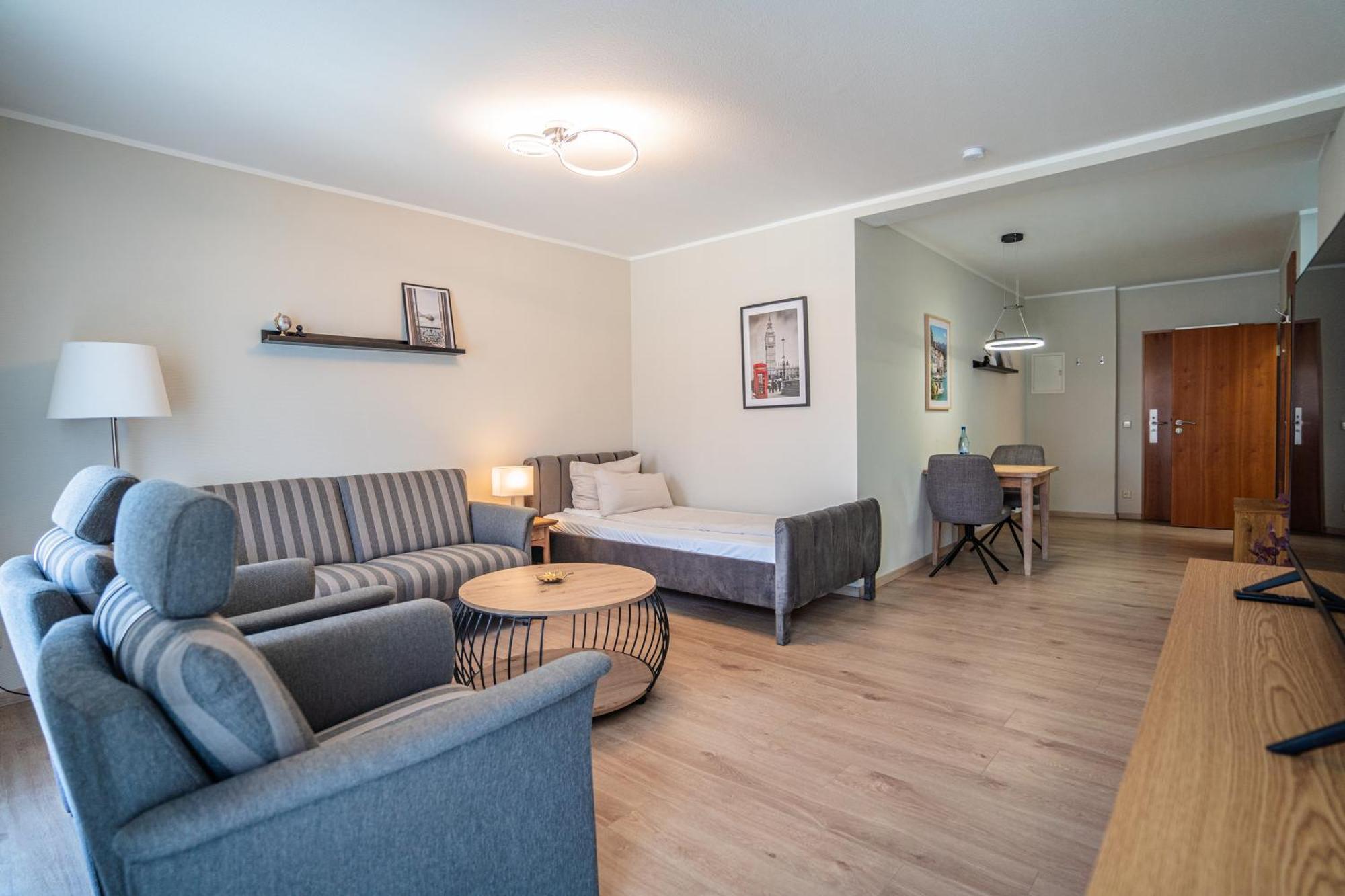 Hotel Cityhome Am Kurpark Бад-Зальцуфлен Экстерьер фото